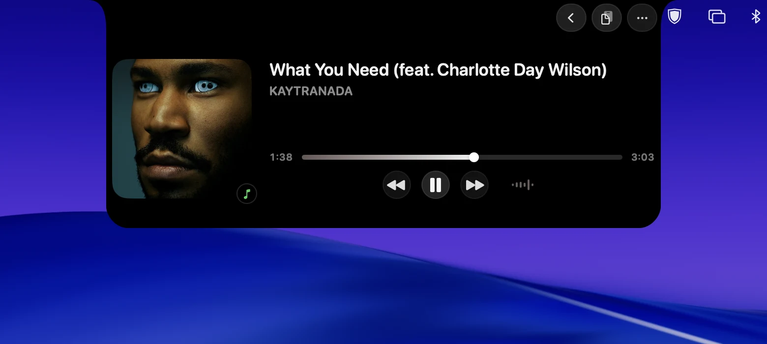 Loch showing a Spotify track playing, with artwork, transport controls, and a scrubber